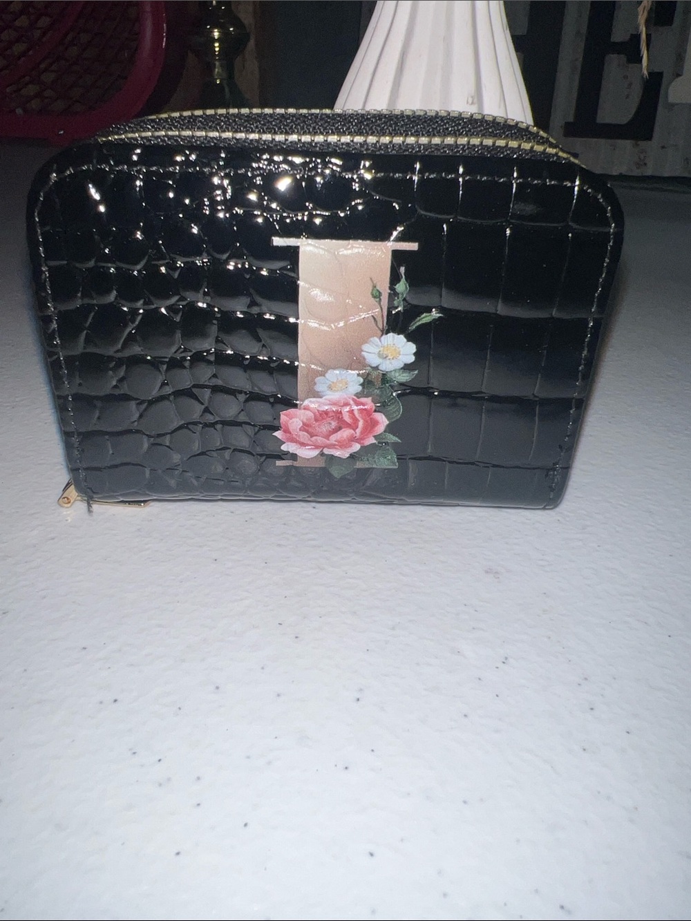 Black Croc-Embossed Initial (I) Floral Zip credit card holder.